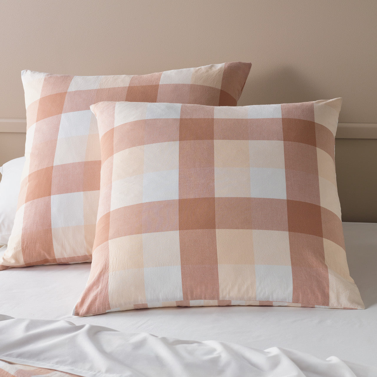 Zoomed in shot of Taree European Pillowcases on bed
