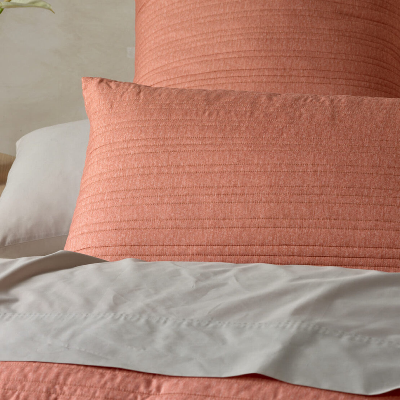 Close up shot of Taya Marle Brandy Pillowcases on bed