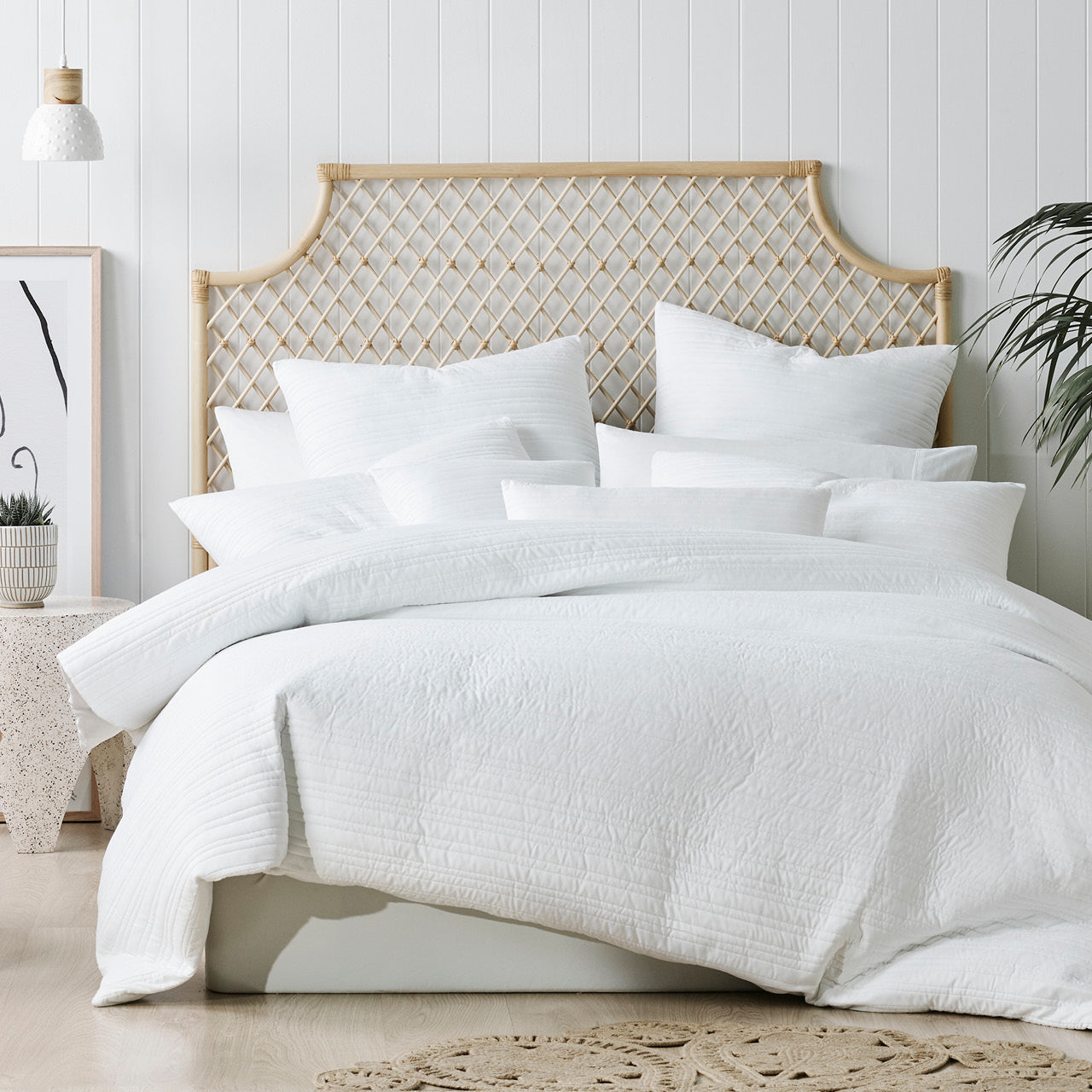 Front on shot of Taya White Quilt Cover Set styled on bed
