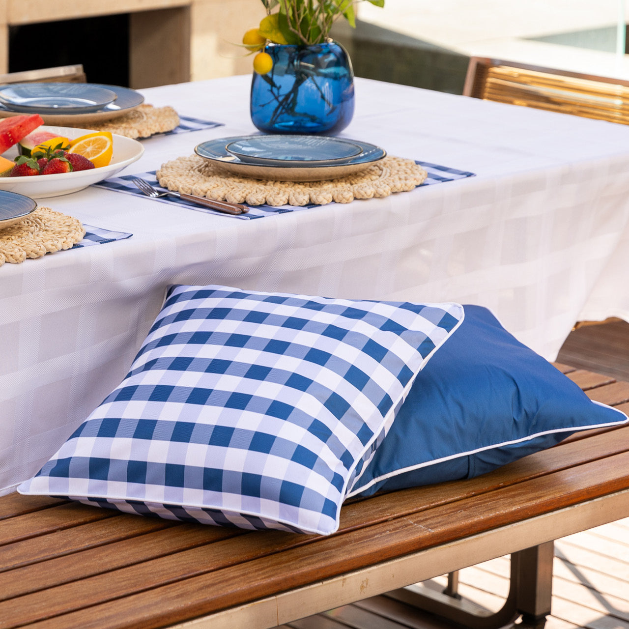 Lifestyle shot of Trinity Scatter Cushions on seat next to table