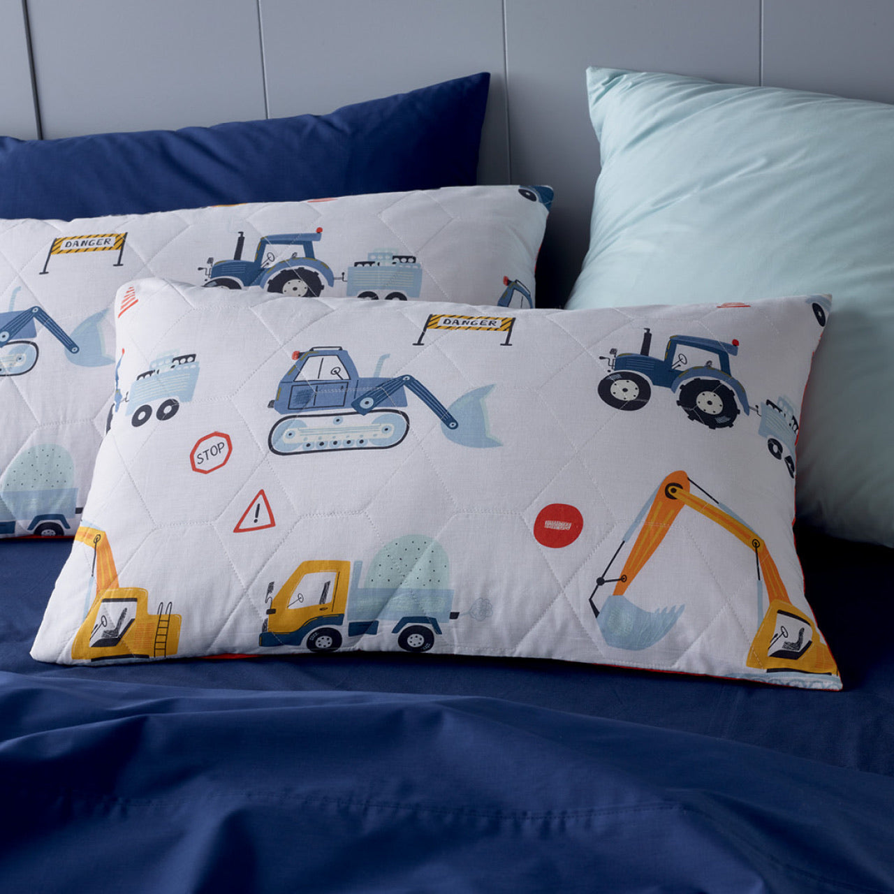 Close up shot of Trucks Pillowcases on bed