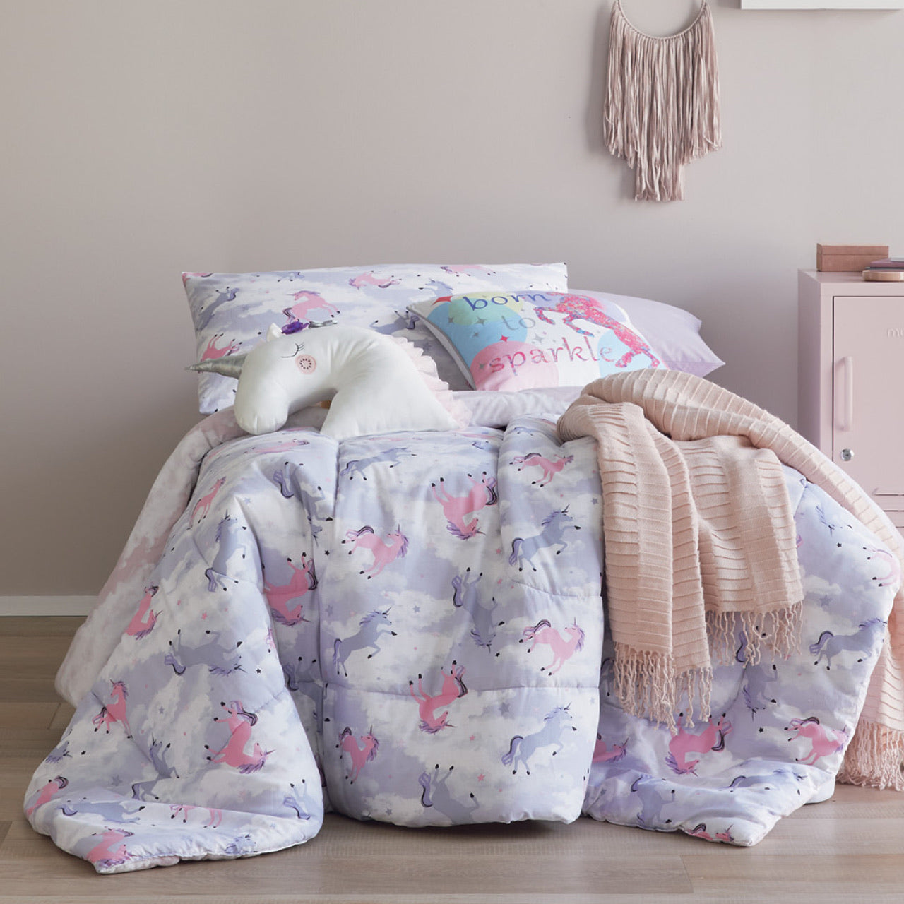 Front on shot of Unicorn Comforter Set styled on bed