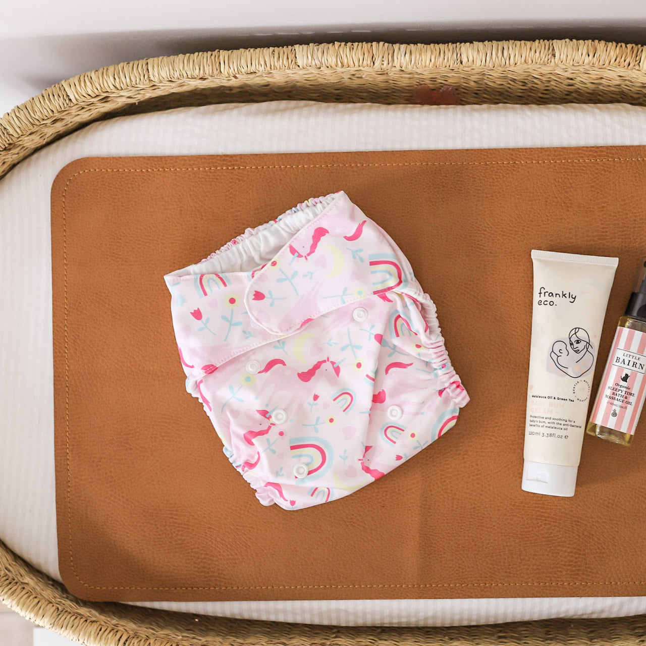 Lifestyle shot of Utopia Reusable Nappy on changing table