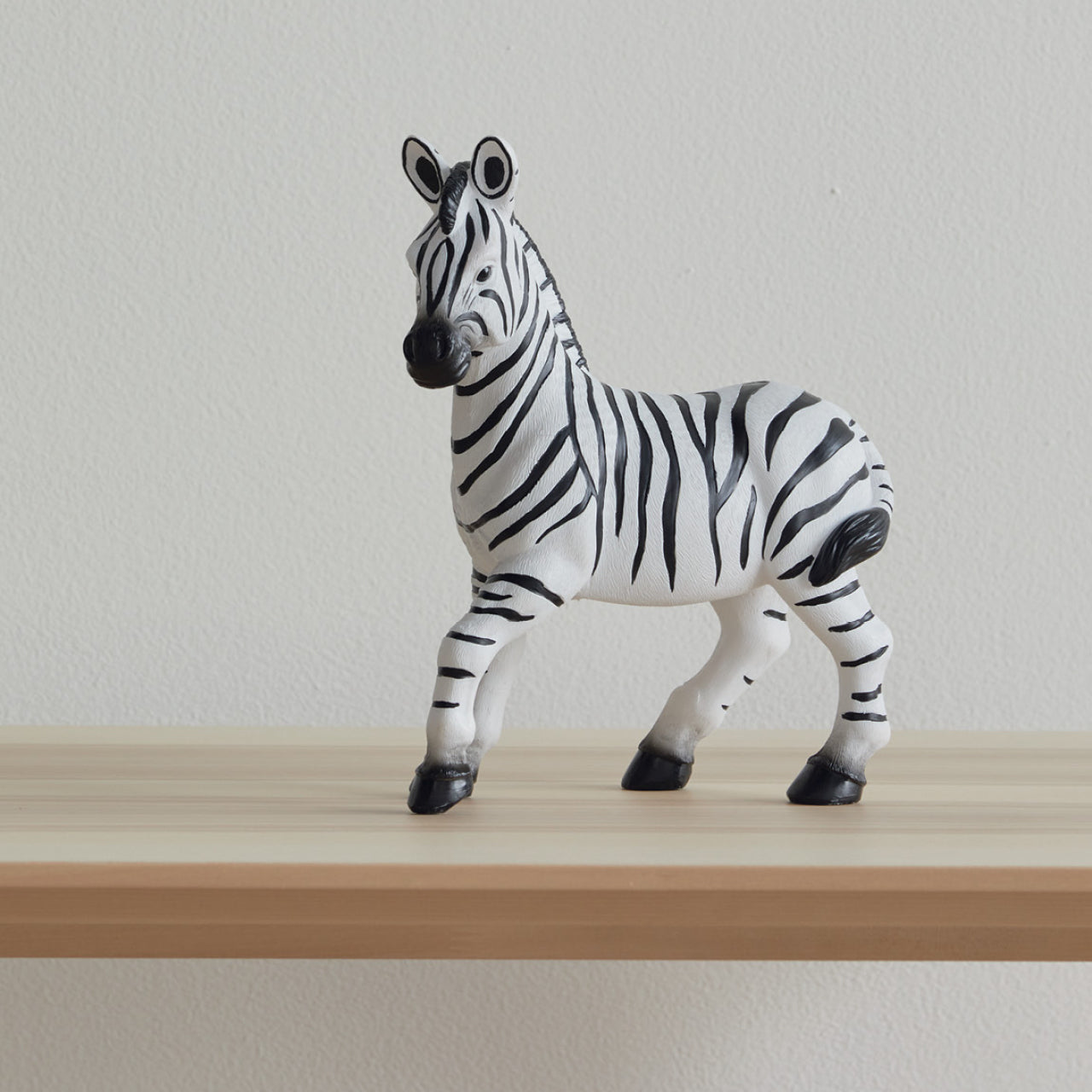 Zebra Night Light standing on a ledge