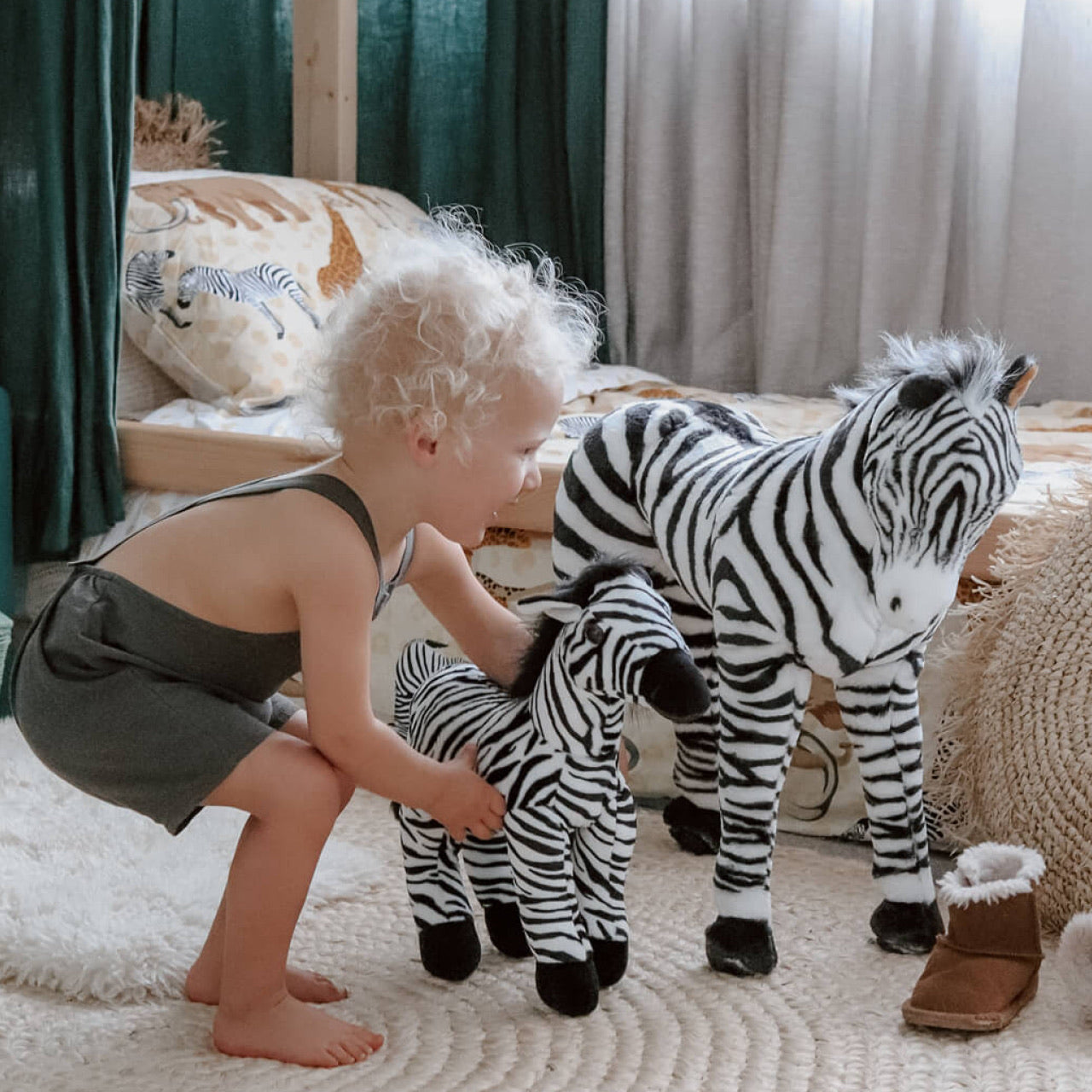 Lifestyle shot of child playing with Zebra Standing Animal