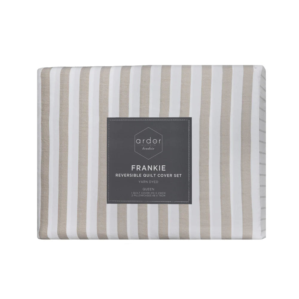 Packaged Frankie reversible quilt cover set with striped pattern on a white background