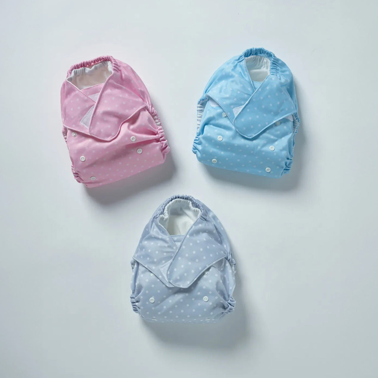 Group shot of all Baby Basics Reusable Nappies