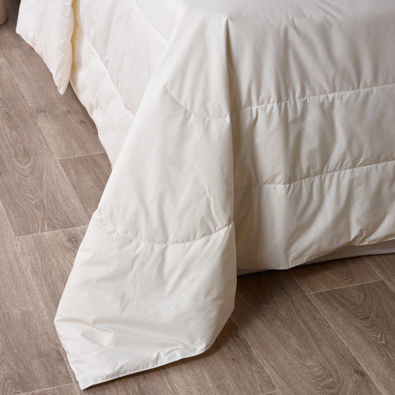 Corner view of Bamboo Wool Quilt on bed 