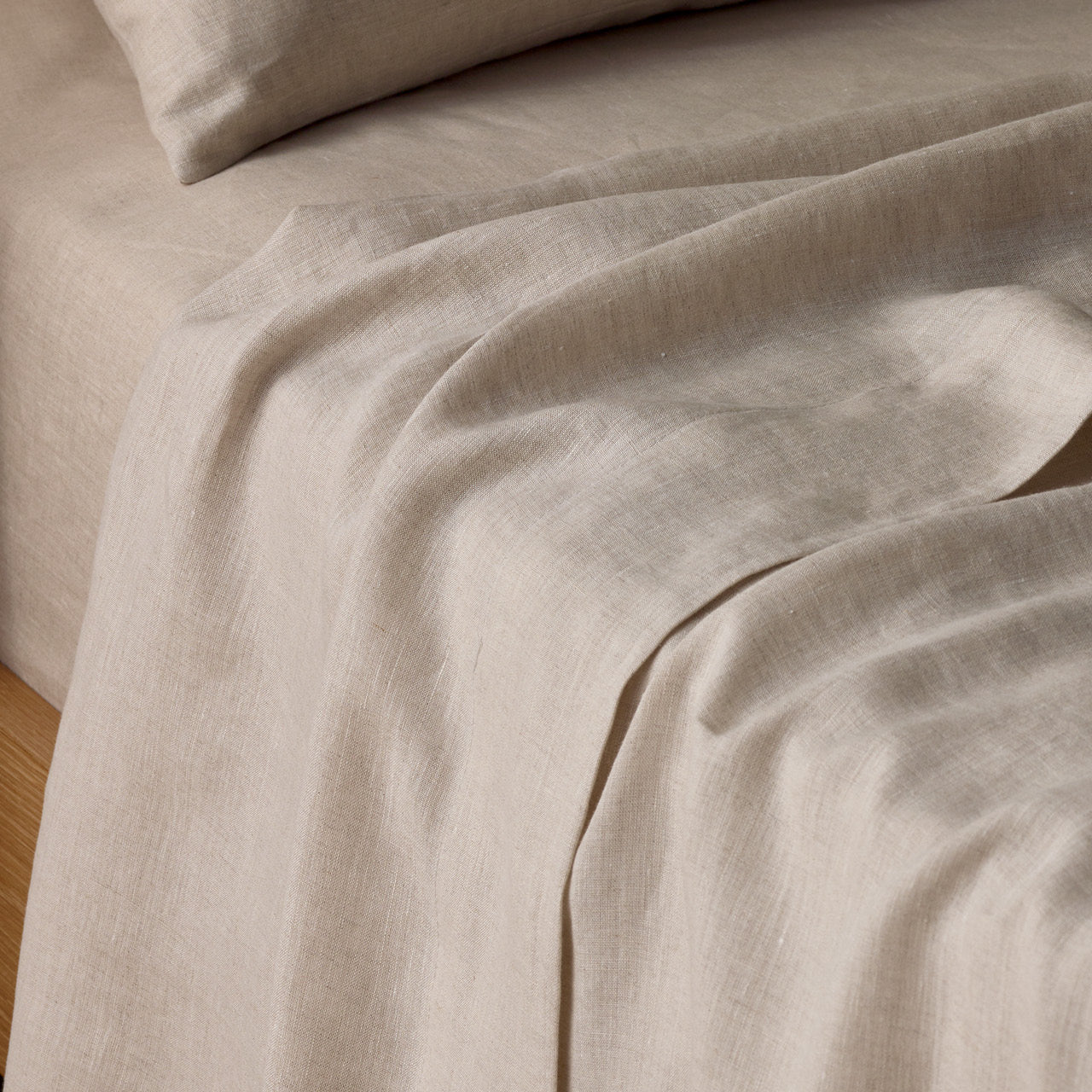 Zoomed in shot of Elayna Natural Sheet Set on bed
