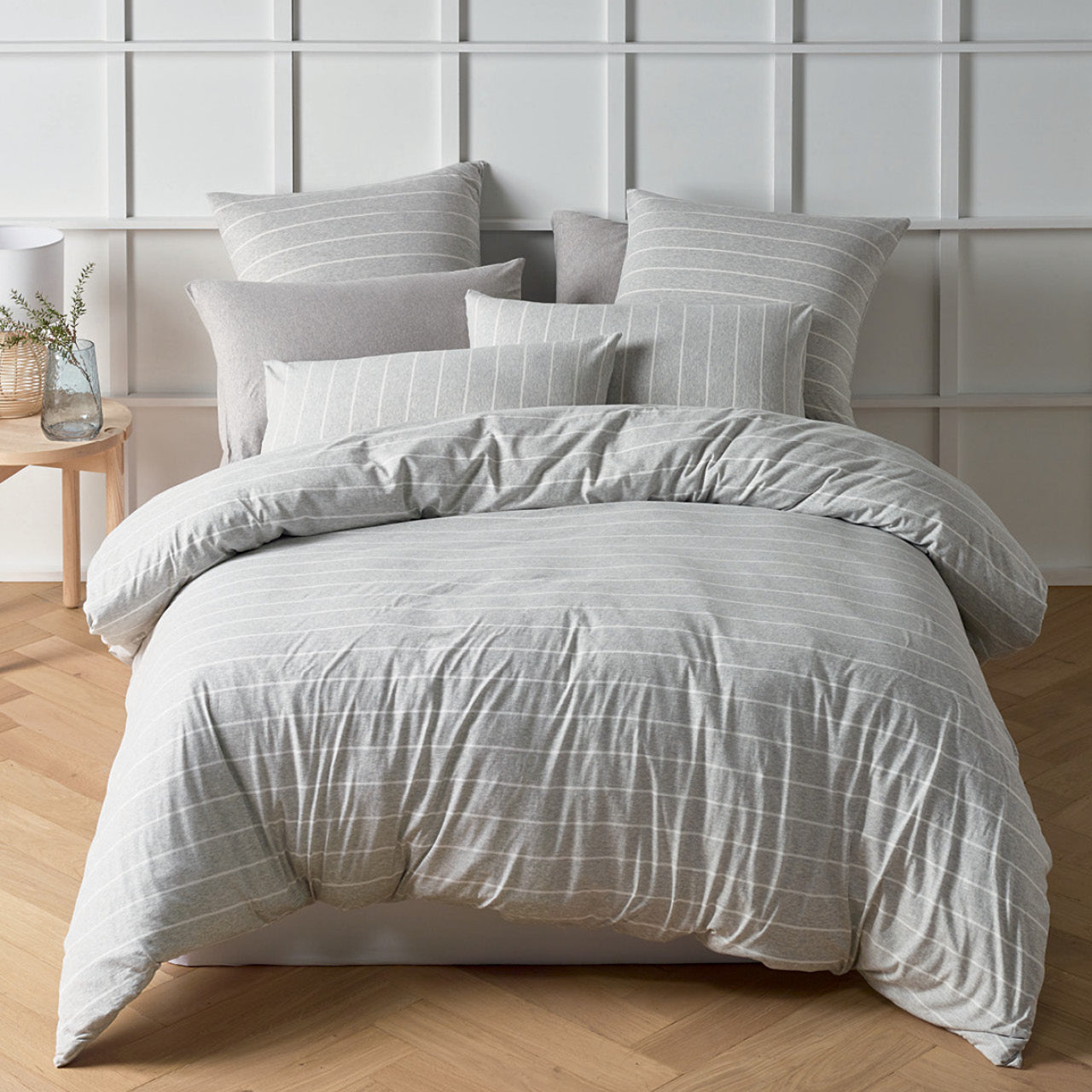 Zoomed out shot of Henley Grey Quilt Cover Set on bed