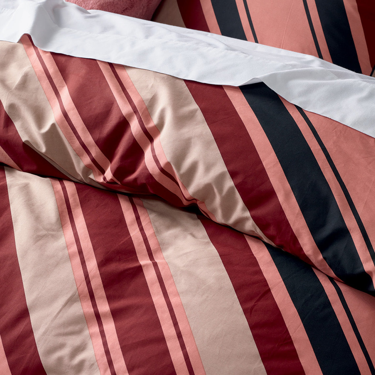 Close up shot of Lido Quilt Cover Set on bed