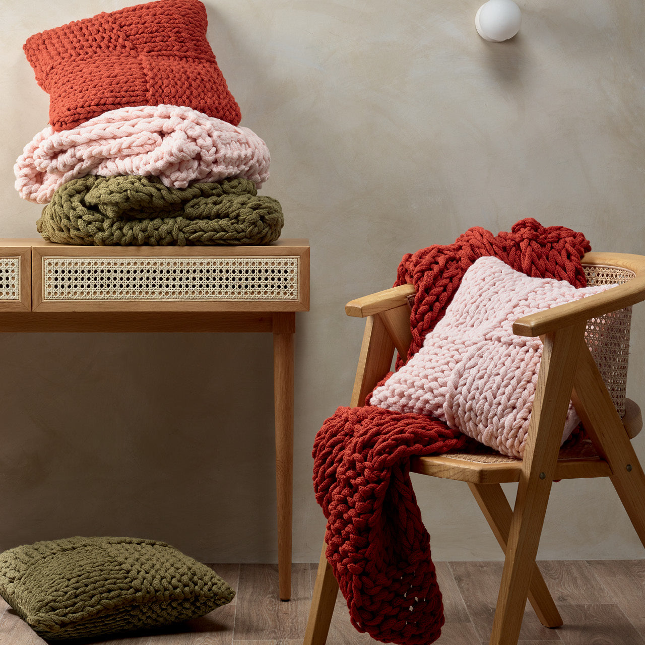 Group shot of Meridian range on a chair, table and floor