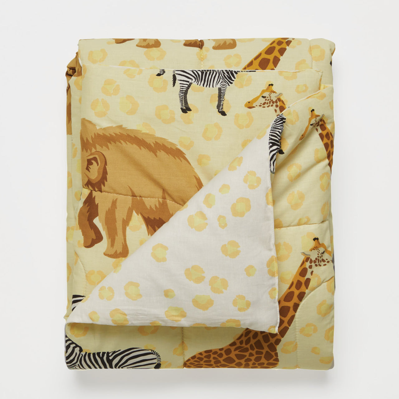 Taronga Cot Comforter on white background